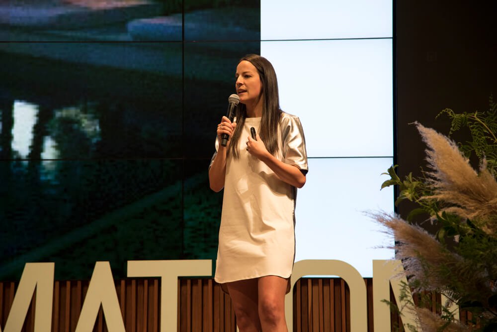 Teresa Truda speaking at a tech conference