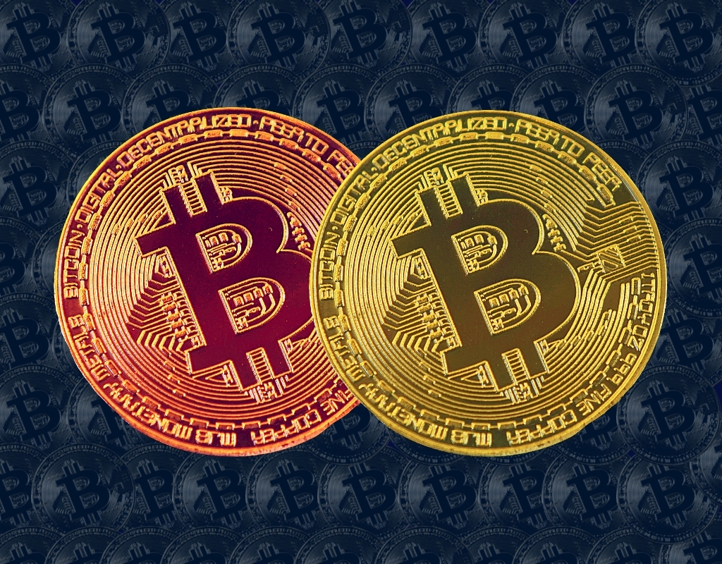 Artist renderings of bitcoins representing the MasterCard logo