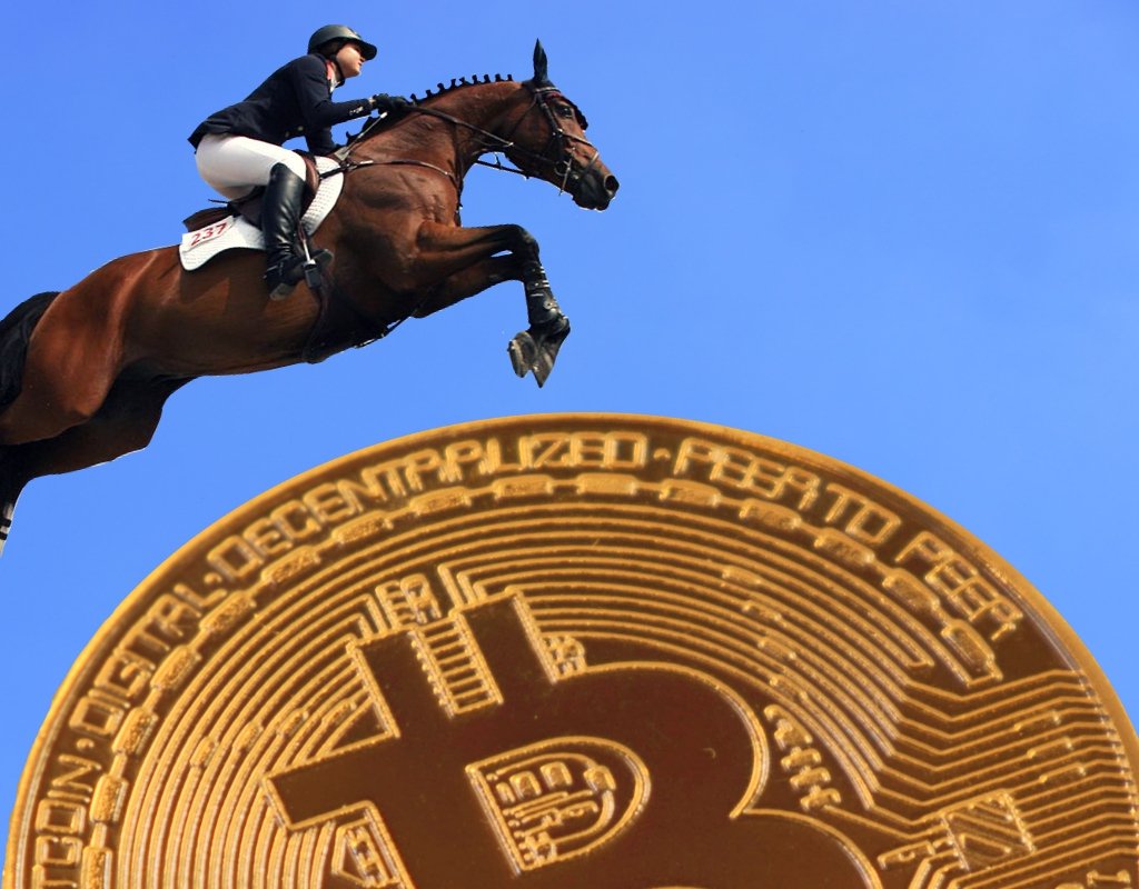 A horse jumps over an artist rendering of a bitcoin.