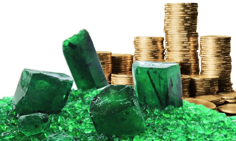 Green gems and gold coins.