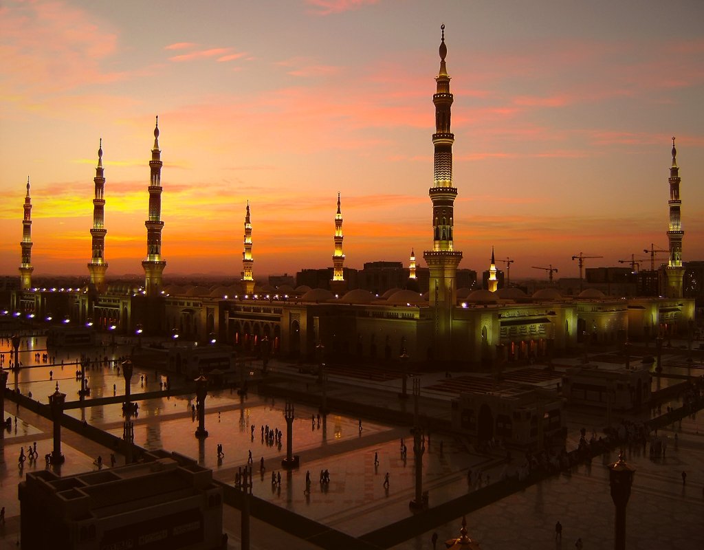 A mosque in Medina, Saudi Arabia, catches the sunset.