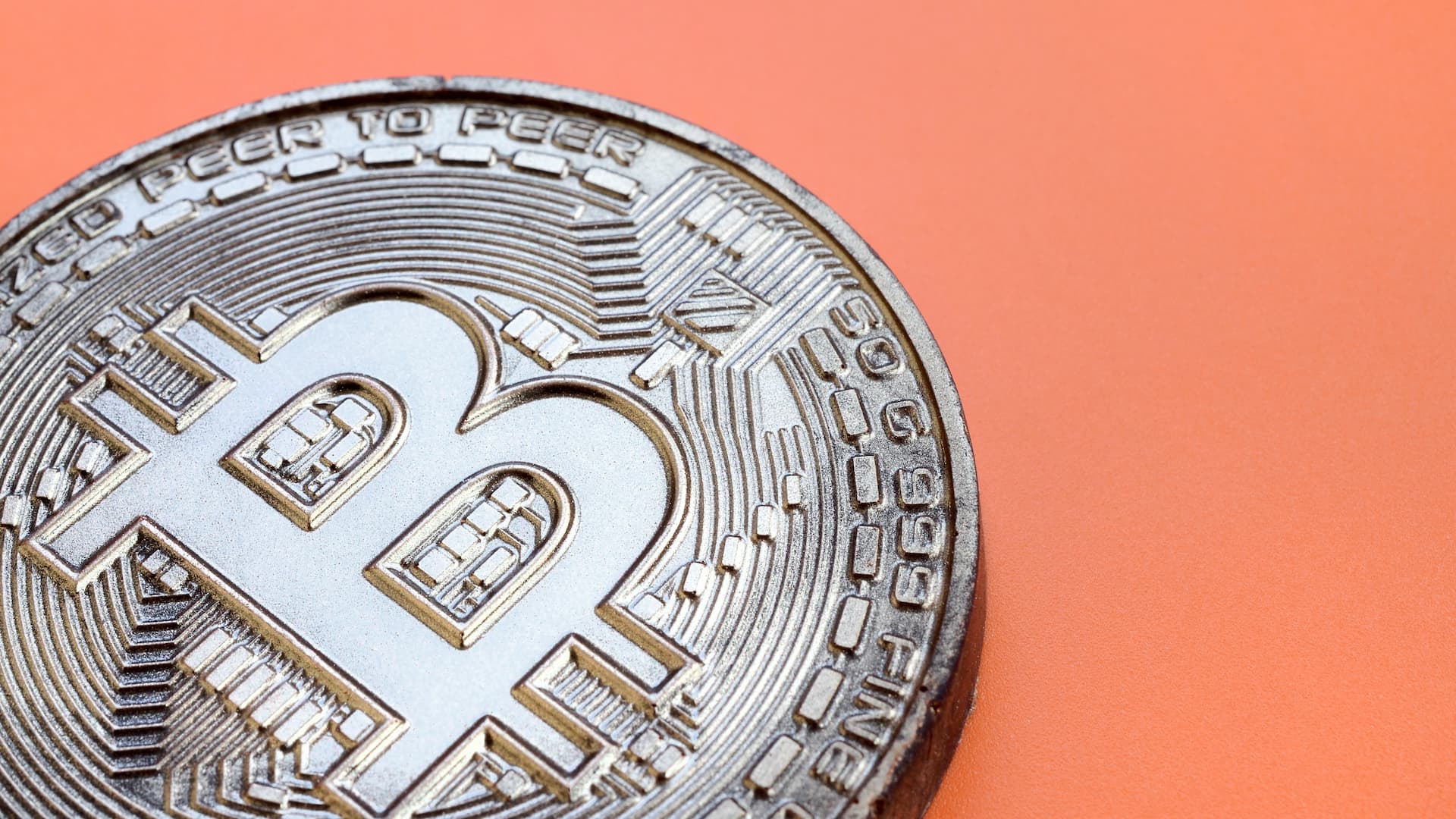 bitcoin on an orange background