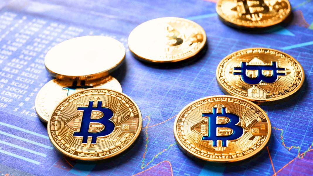 Golden bitcoins on chart - finance trading